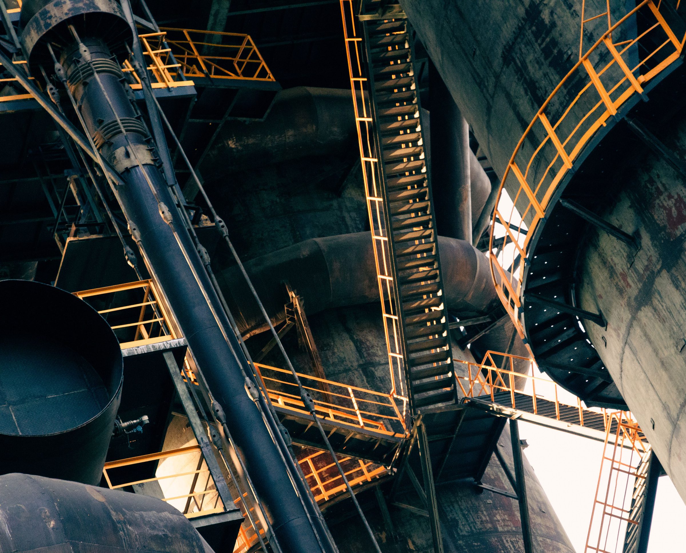 Stairways and ducting on a plant structure lit at night