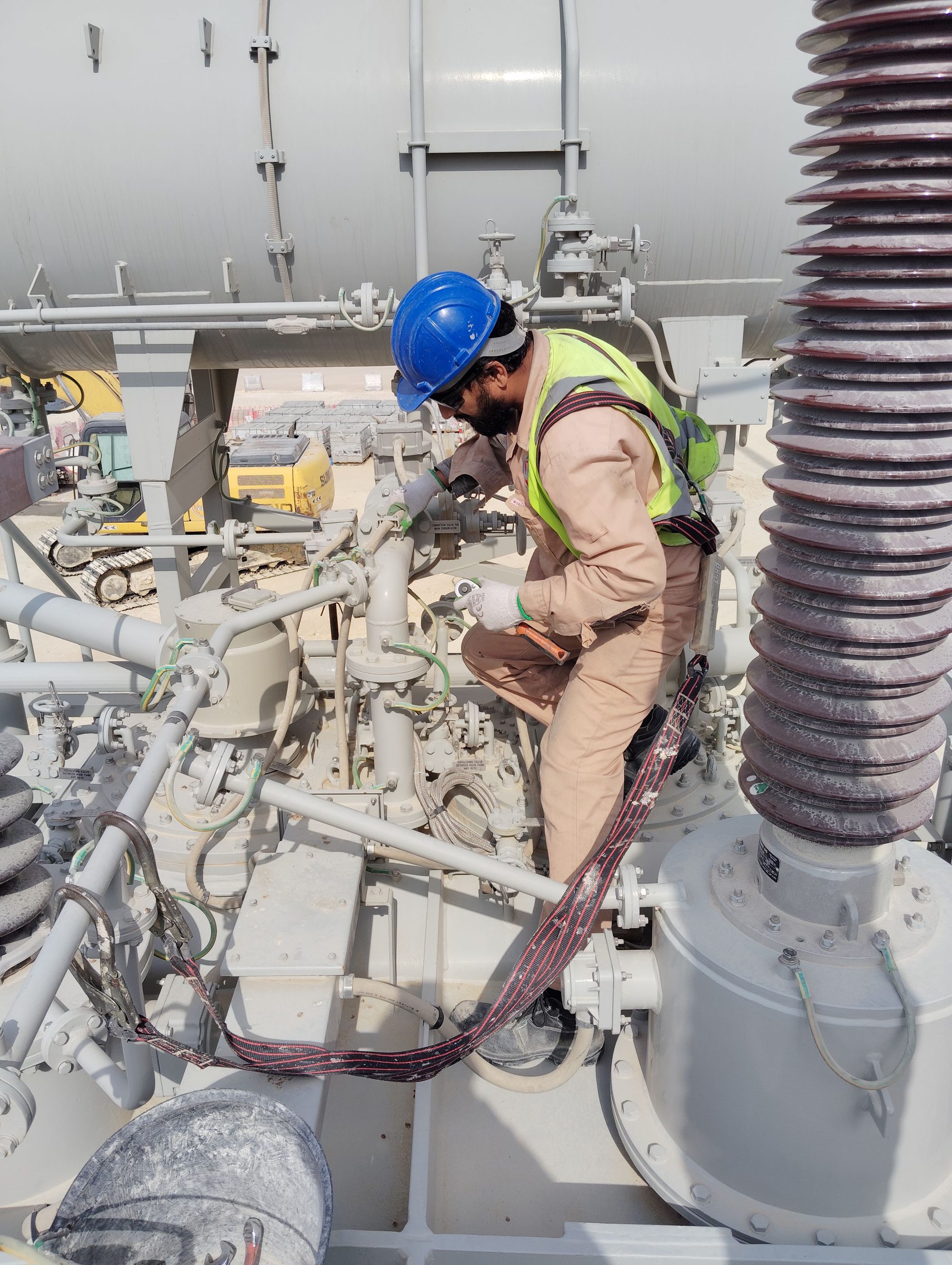 Engineer working on equipment on site