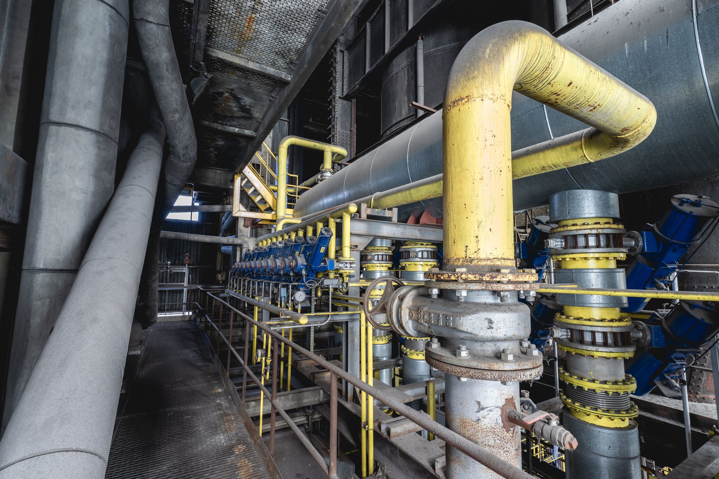 Piping and valves inside a plant hall